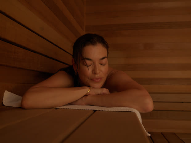 A guest resting in the EQ Bathhouse